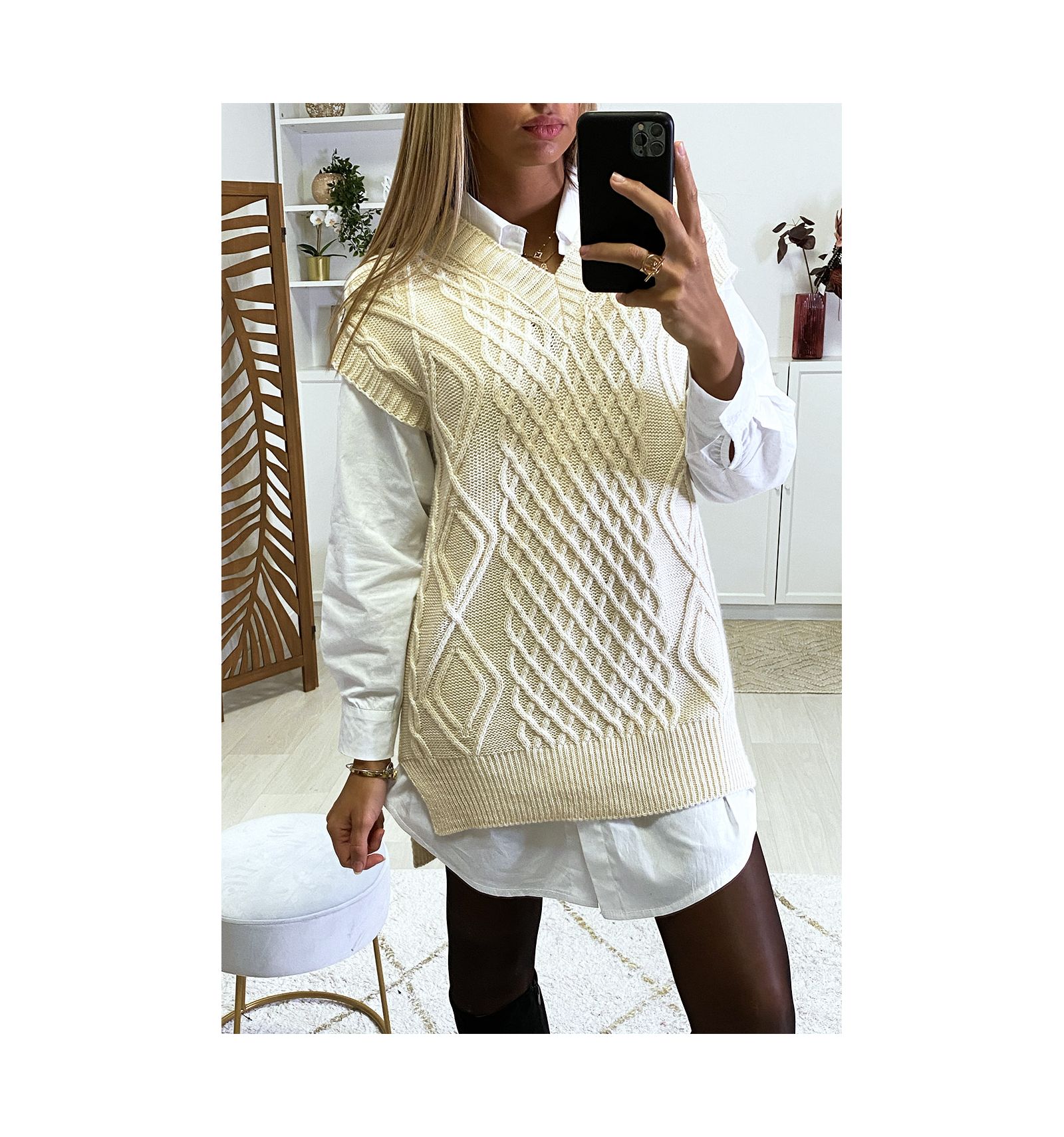 Beige Vneck sleeveless sweater with slits on the sides. Women's sweater