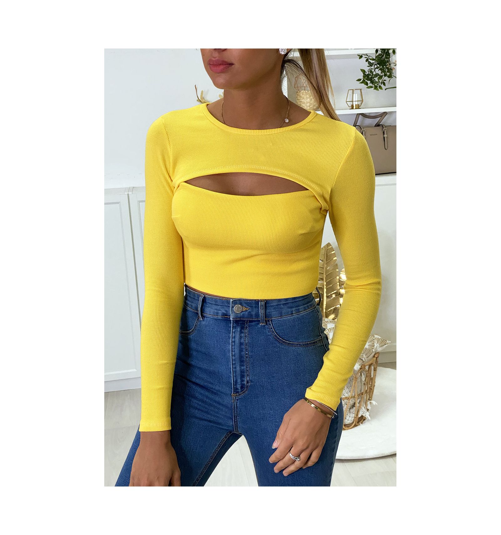 Yellow stretch knit crop top open at the bust. Woman fashion