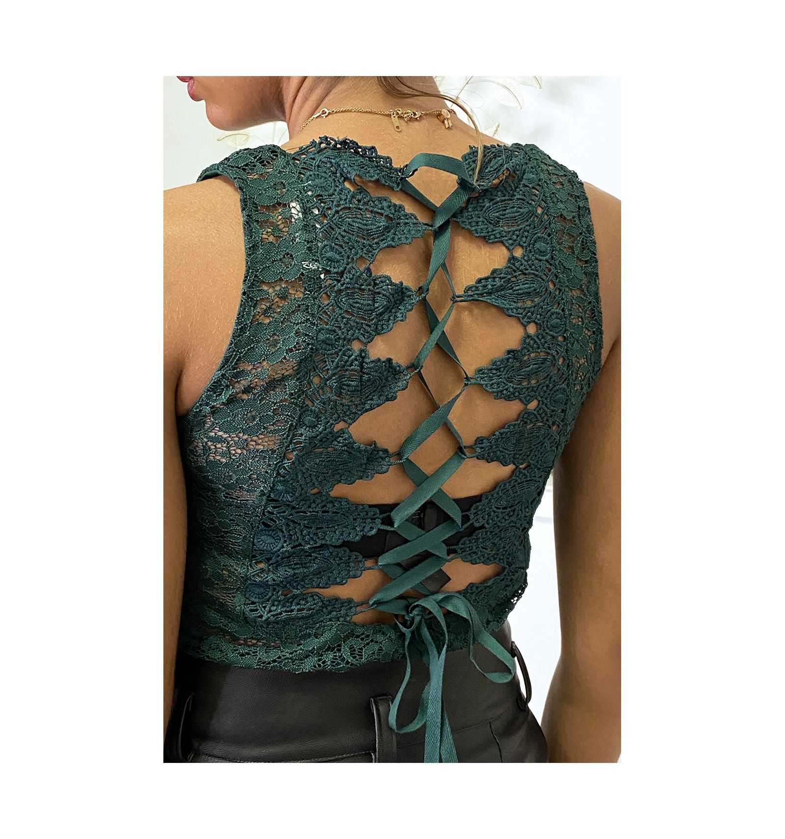 Green lace bodysuit with embroidery and lace at the back. Very chic