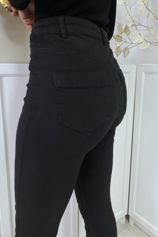 Jean slim noir taille haute à poches arrières Jean slim noir taille haute à poches arrières