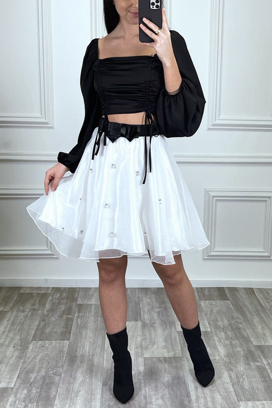 Jupe noire en tulle coupe évasée à perles Jupe noire en tulle coupe évasée à perles
