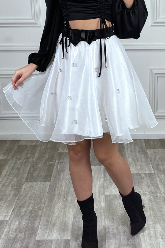 Jupe noire en tulle coupe évasée à perles Jupe noire en tulle coupe évasée à perles