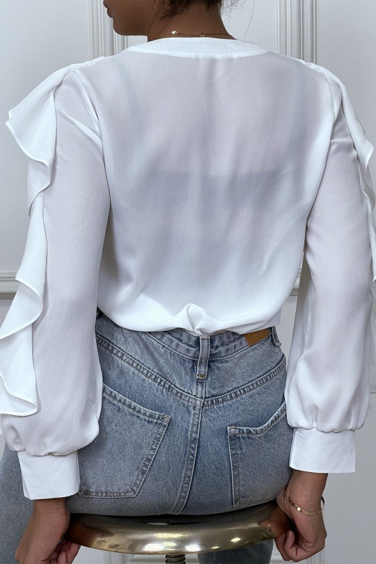 Chemise rose pale avec volant à l'avant et aux manches Chemise rose pale avec volant à l'avant et aux manches