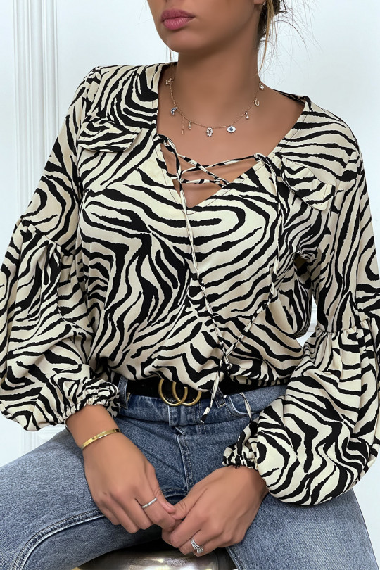 Blouse beige imprimés zébré à manches longues bouffantes Blouse beige imprimés zébré à manches longues bouffantes