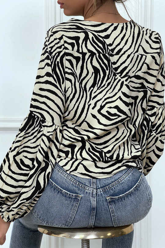 Blouse beige imprimés zébré à manches longues bouffantes Blouse beige imprimés zébré à manches longues bouffantes