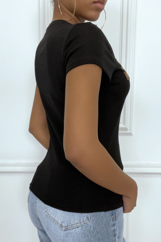 Tee-shirt blanc avec écriture dorée Tee-shirt blanc avec écriture dorée