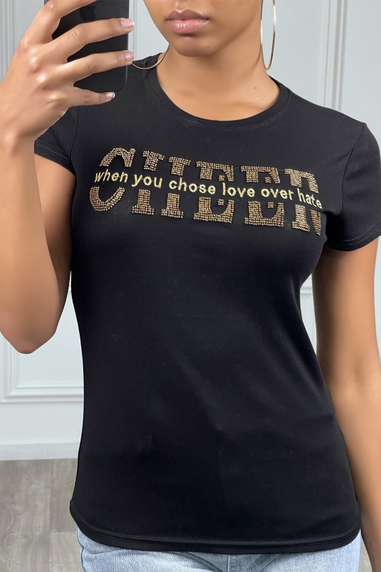 Tee-shirt blanc avec écriture dorée Tee-shirt blanc avec écriture dorée