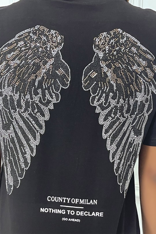 Tee-shirt noir oversize avec écriture et dessins en strass Tee-shirt noir oversize avec écriture et dessins en strass