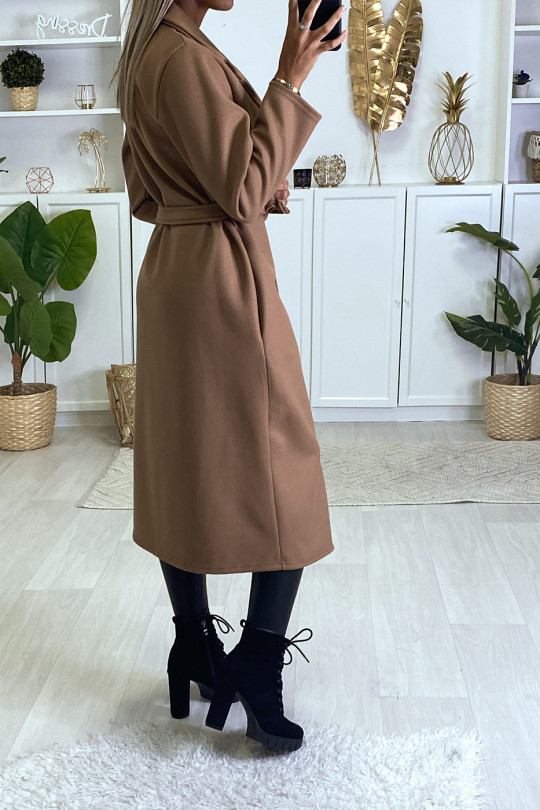 Long manteau croisé en rose avec poches boutons et ceinture Long manteau croisé en rose avec poches boutons et ceinture