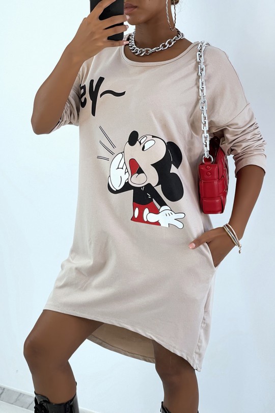 Robe tunique beige avec poches et dessin à l'avant Robe tunique beige avec poches et dessin à l'avant