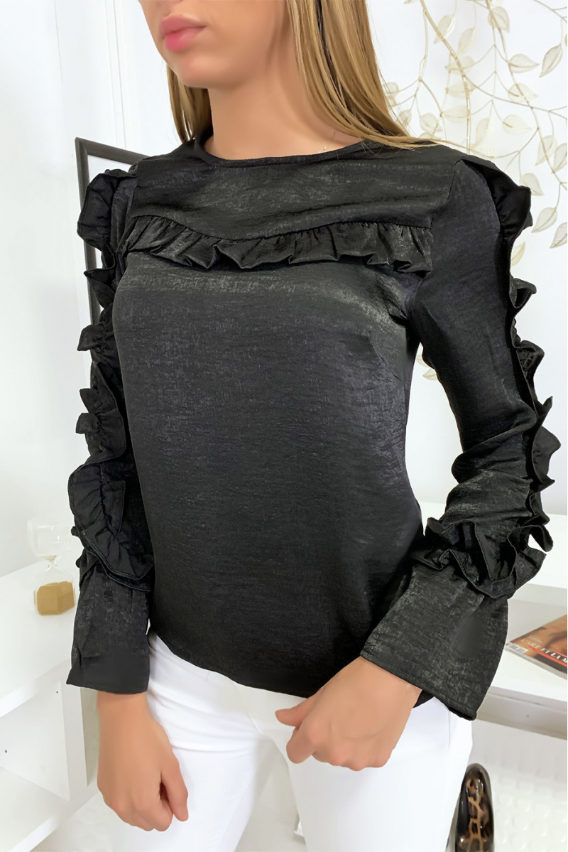 Blouse noir matière brillante avec froufrou au buste et aux manches Blouse noir matière brillante avec froufrou au buste et aux manches
