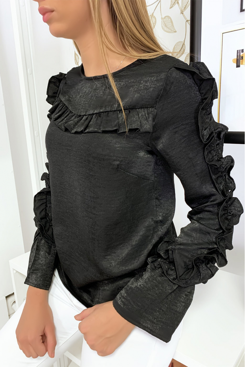 Blouse noir matière brillante avec froufrou au buste et aux manches Blouse noir matière brillante avec froufrou au buste et aux manches