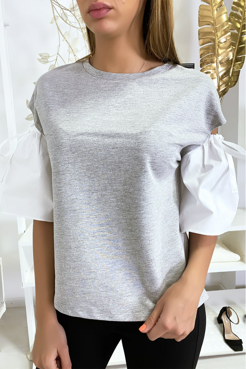 Haut gris bi-matière avec manche bouffante dénudé Haut gris bi-matière avec manche bouffante dénudé