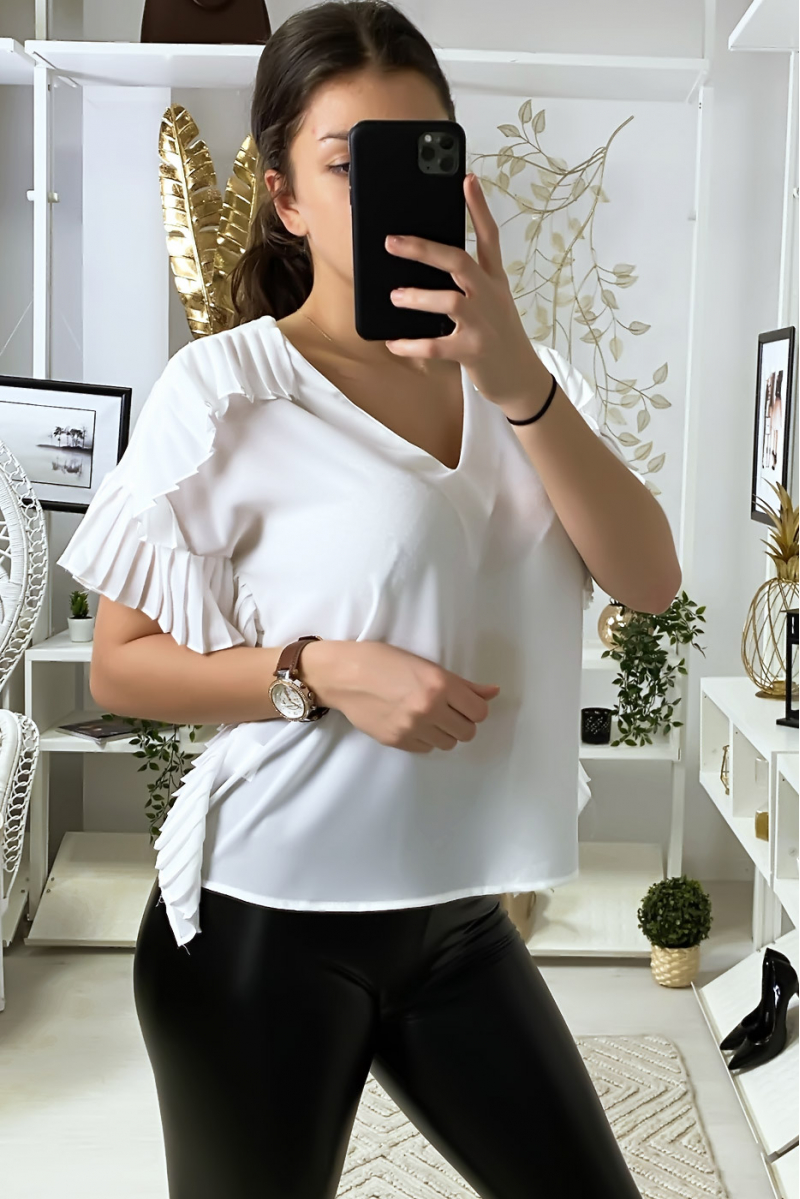 Blouse blanche en crêpe avec plissé sur les contours Blouse blanche en crêpe avec plissé sur les contours