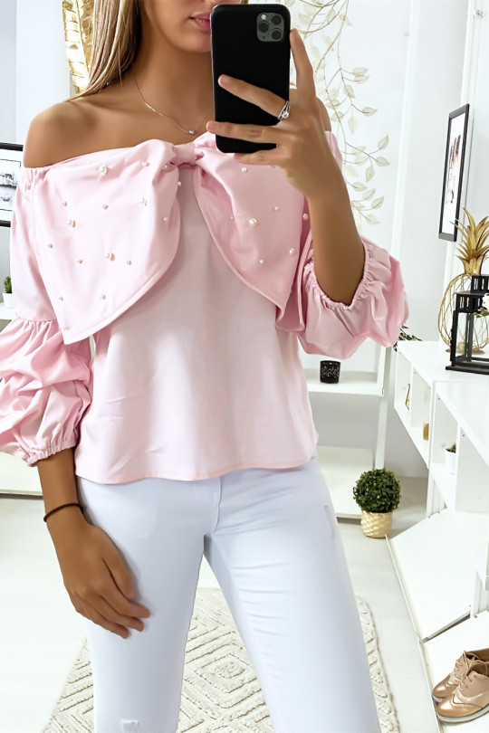 Blouse rose avec papillons ornée de strass à l'avant Blouse rose avec papillons ornée de strass à l'avant
