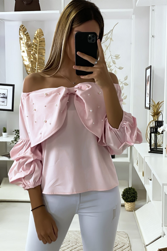 Blouse rose avec papillons ornée de strass à l'avant Blouse rose avec papillons ornée de strass à l'avant