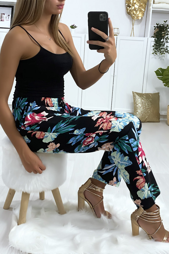 Zwarte fuchsia blauwe broek met bloemmotief van katoen met zakken Zwarte fuchsia blauwe broek met bloemmotief van katoen met zakken