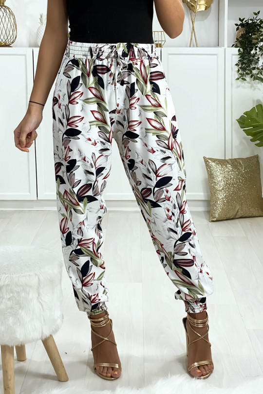 Pantalon blanc motif fleuris elastique aux chevilles avec poches Pantalon blanc motif fleuris elastique aux chevilles avec poches
