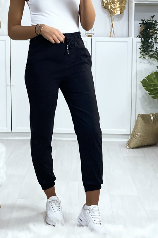 Pantalon jogging noir avec poche serré en bas Pantalon jogging noir avec poche serré en bas