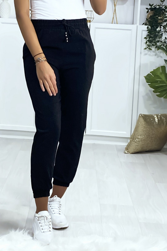 Pantalon jogging noir avec poche serré en bas Pantalon jogging noir avec poche serré en bas