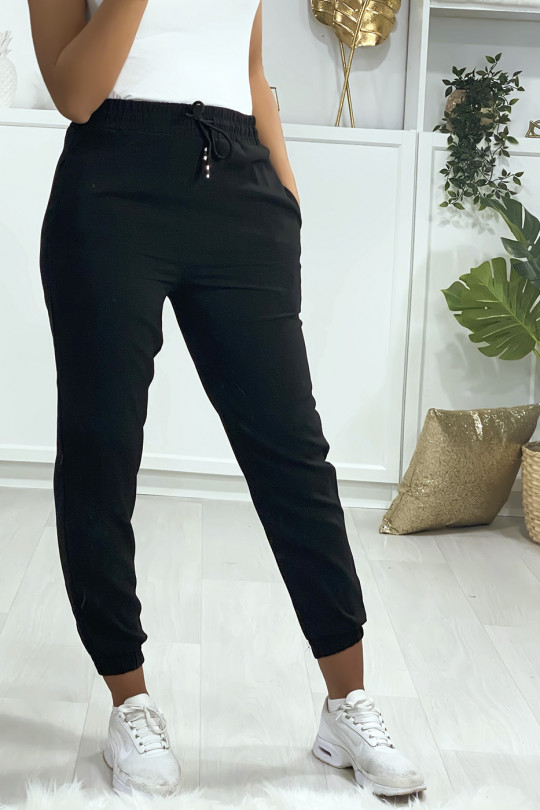 Pantalon jogging noir avec poche serré en bas Pantalon jogging noir avec poche serré en bas