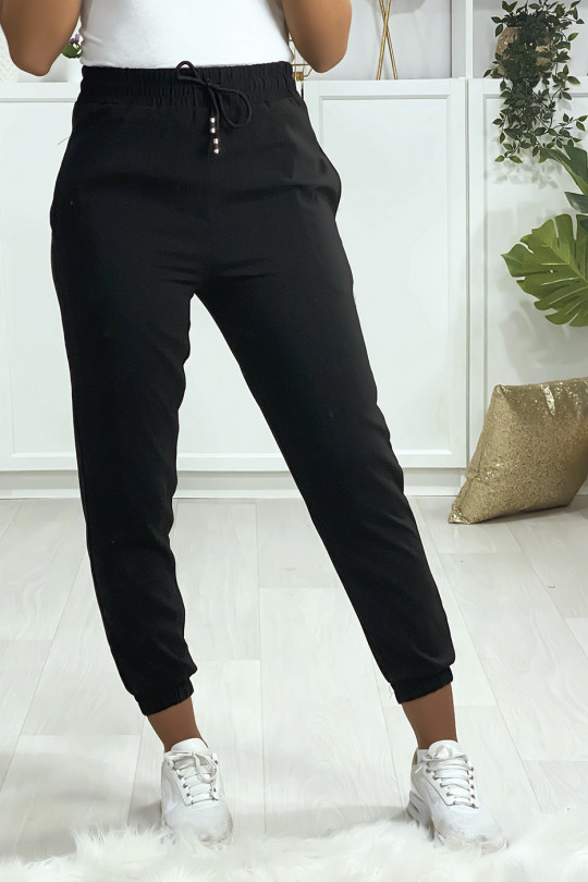 Pantalon jogging noir avec poche serré en bas Pantalon jogging noir avec poche serré en bas