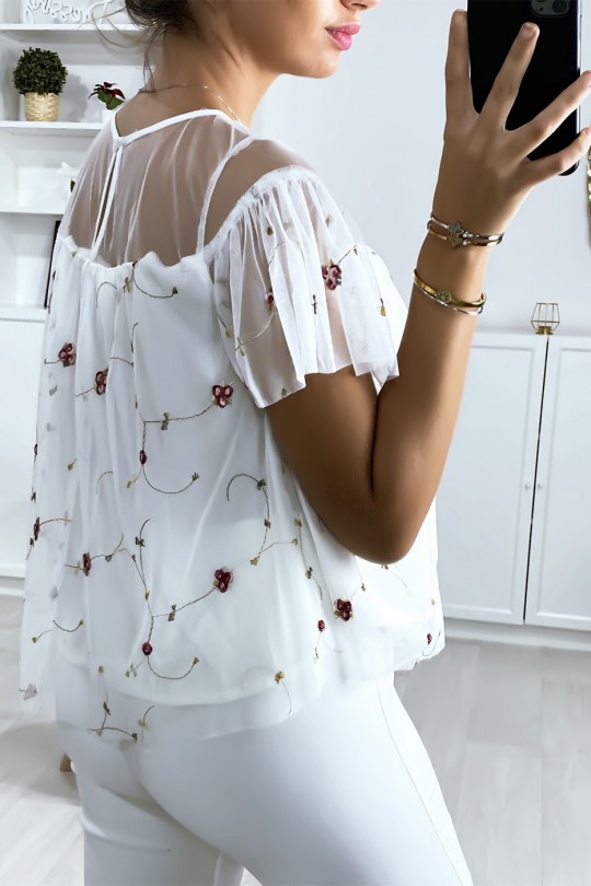 Blouse blanche à volant en tulle brodé Blouse blanche à volant en tulle brodé