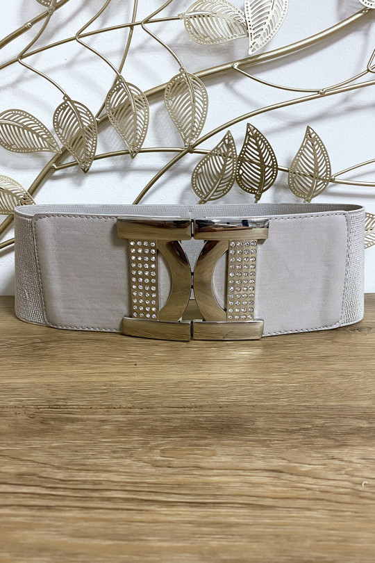 Ceinture beige avec joli boucle argenté ornée de strass Ceinture beige avec joli boucle argenté ornée de strass