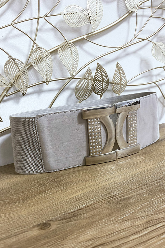 Ceinture beige avec joli boucle argenté ornée de strass Ceinture beige avec joli boucle argenté ornée de strass