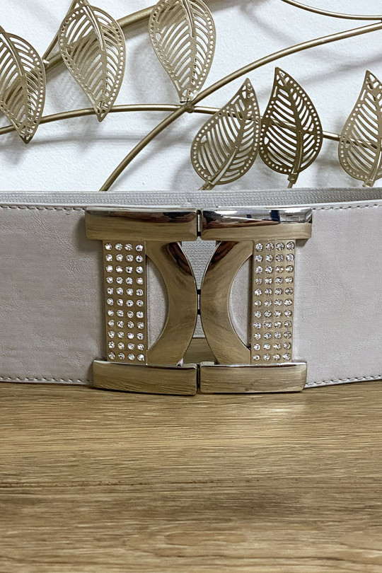 Ceinture beige avec joli boucle argenté ornée de strass Ceinture beige avec joli boucle argenté ornée de strass